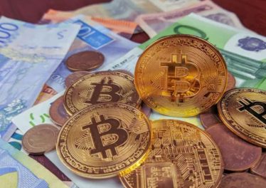 Bitcoin and Other Cryptocurrencies Tumble as US Authorities Target Binance; US Equities Gain Amidst Banking Sector Stabilization